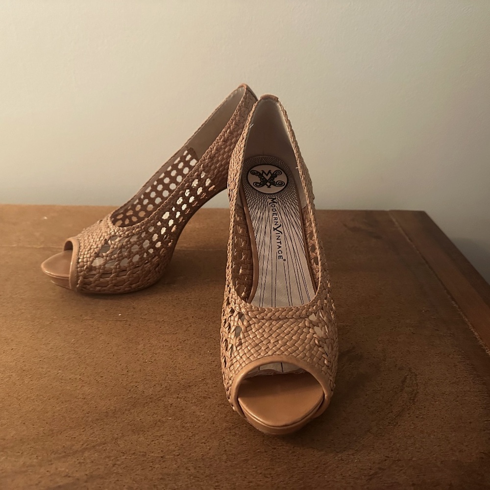 Modern Vintage woven leather peep-toe heels.
